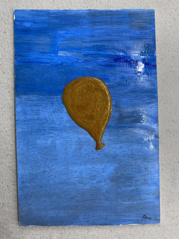 Golden Balloon finds Contrast to the Deep Blue Sky Cover